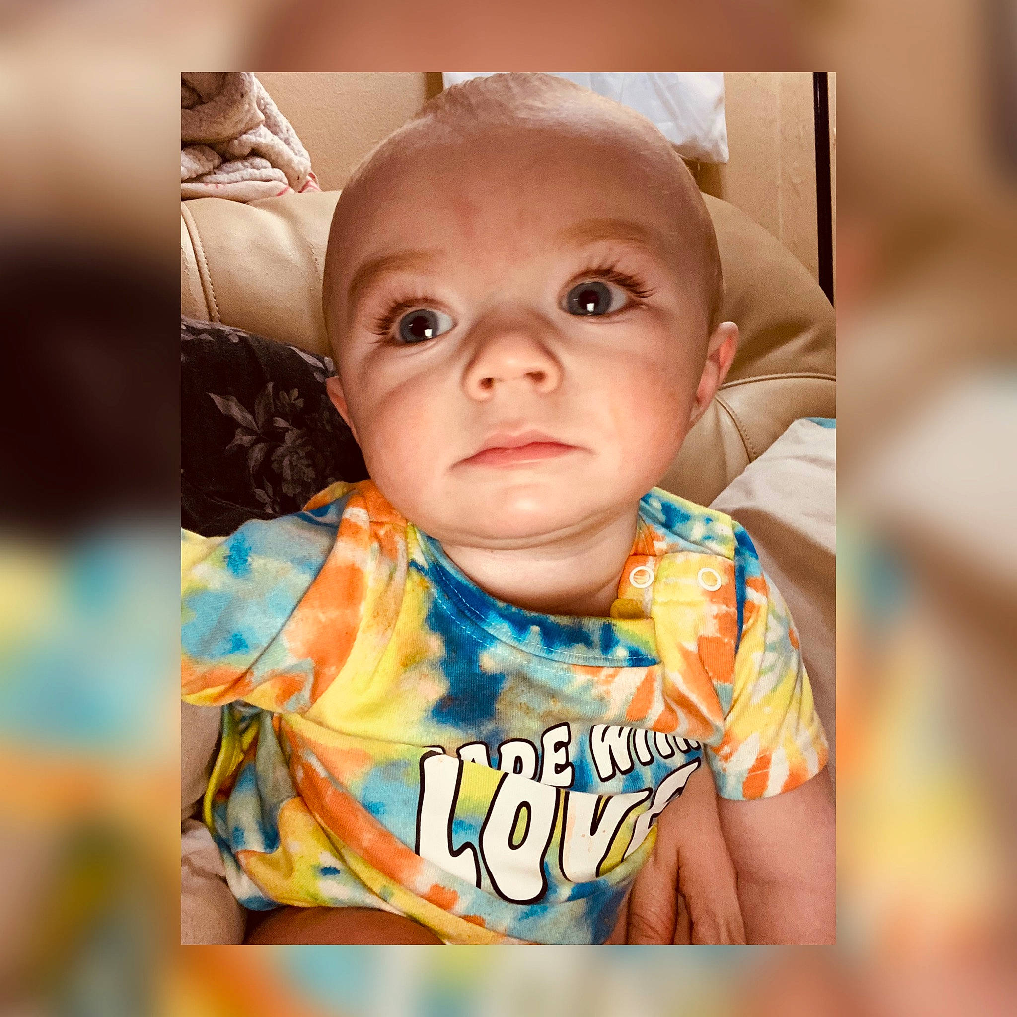 Blaze is registered to the contest to win money with this photo: baby, baby_toddler_clothing, cheek, child, eye, eyebrow, eyelash, happy, head, iris, nose, outerwear, pattern, person, photo_caption, photomontage, portrait_photography, selfie, sleeve, t_shirt