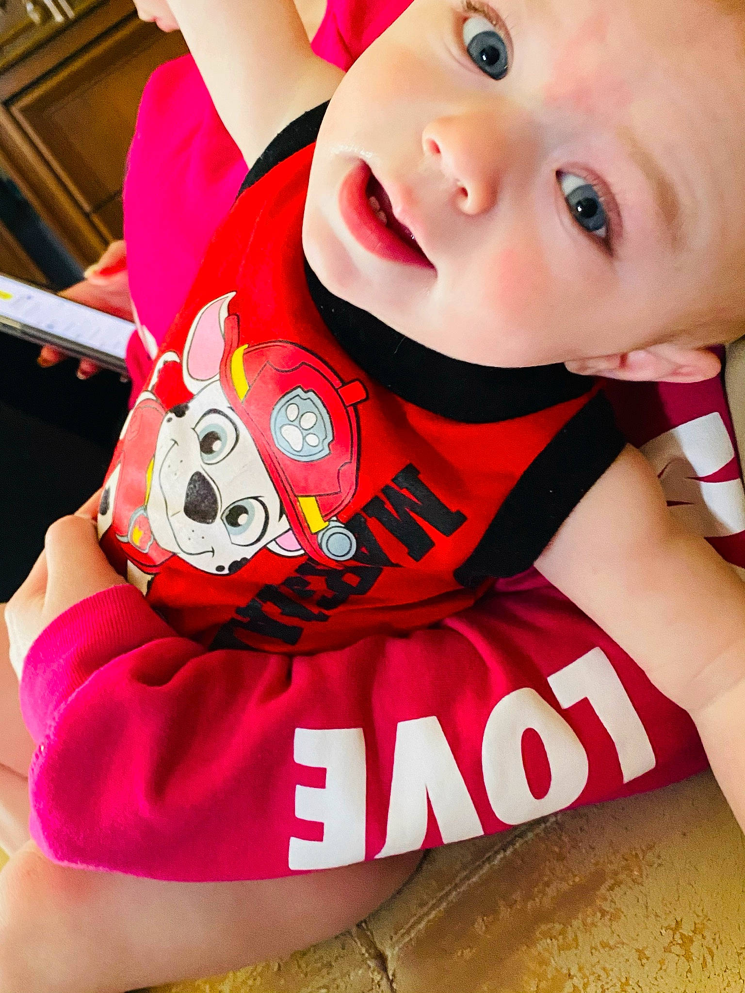 Blaze is registered to the contest to win money with this photo: baby, baby_toddler_clothing, carmine, child, cool, fashion_accessory, finger, font, fun, happy, magenta, neck, pattern, person, pink, red, sleeve, t_shirt, thigh, toddler