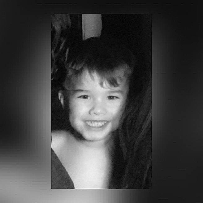 Micah joined the competition — help win amazing prizes! black_and_white, cheek, child_model, darkness, flash_photography, fun, happy, jaw, joy, laugh, monochrome, monochrome_photography, person, photo_caption, portrait, portrait_photography, room, sitting, smile, t_shirt