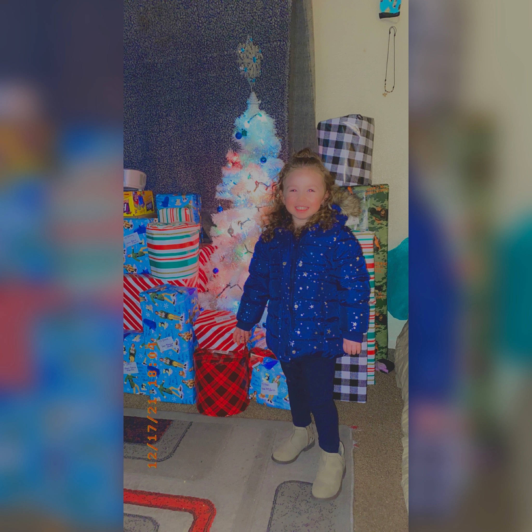 Janelle is registered to the contest to win money with this photo: art, boot, child, christmas, christmas_decoration, christmas_ornament, christmas_tree, creative_arts, electric_blue, event, fun, holiday, holiday_ornament, joy, pattern, person, play, room, textile, tree