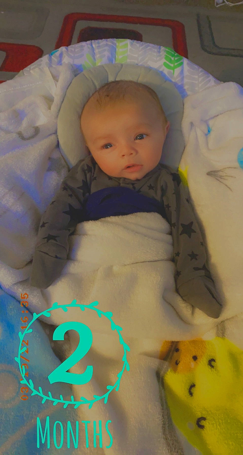 Liam joined the competition — help win amazing prizes! baby, baby_products, baby_safety, baby_toddler_clothing, baby_toys, cheek, child, comfort, green, infant_bed, linens, nose, person, pink, product, room, skin, sleeve, textile, toddler