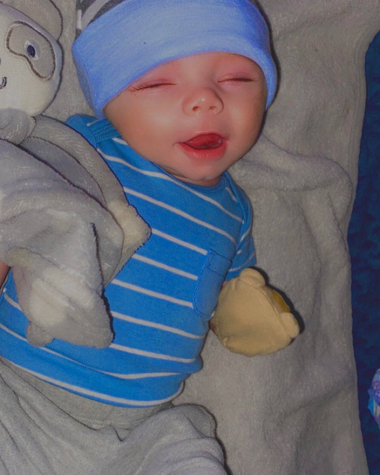 Liam joined the competition — help win amazing prizes! azure, baby, baby_sleeping, baby_toddler_clothing, blue, cap, cheek, child, comfort, eye, face, facial_expression, headgear, headwear, nose, person, product, skin, sleeve, textile