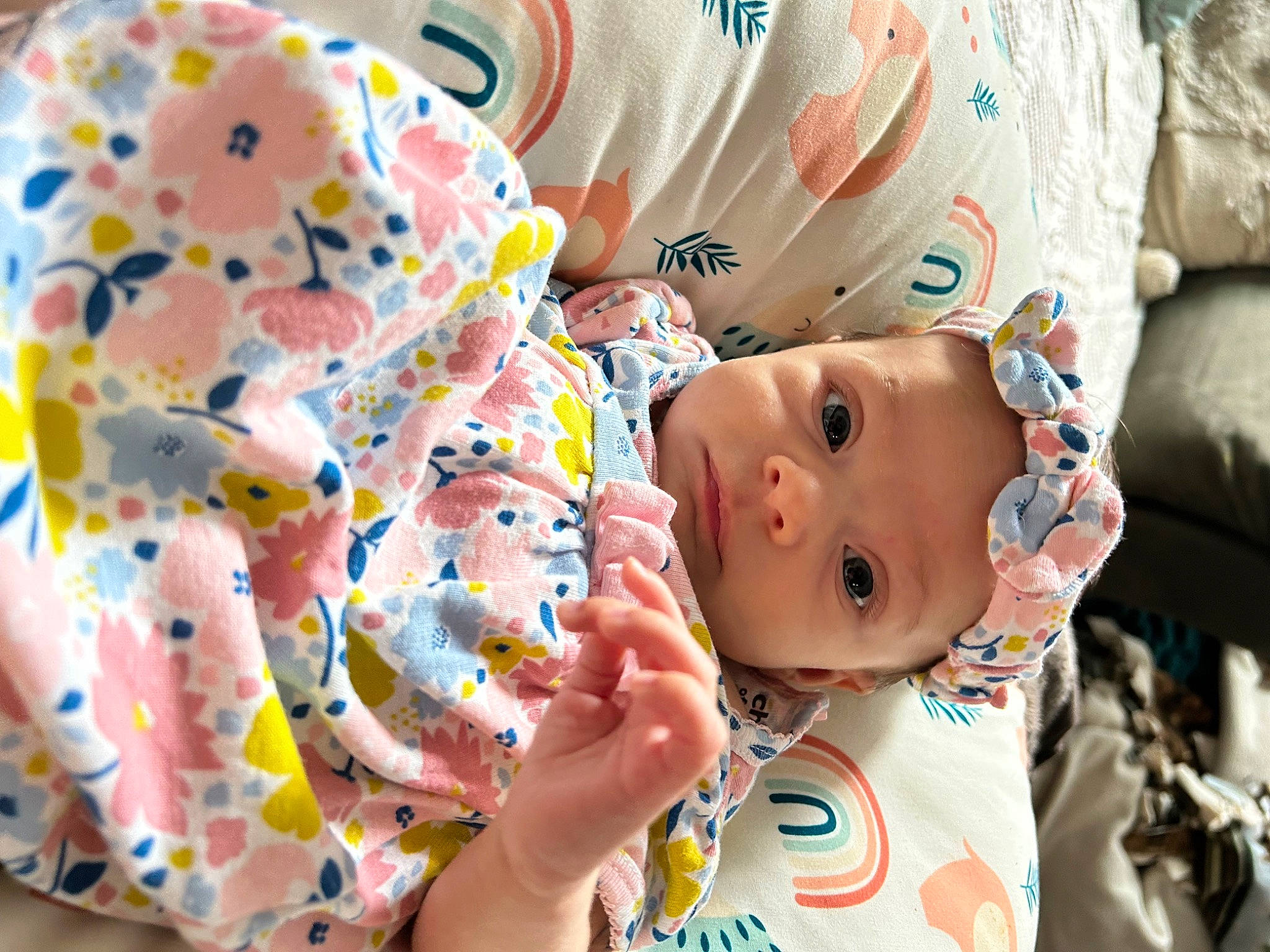 Zoey is registered to the contest to win money with this photo: baby, baby_products, baby_toddler_clothing, cheek, child, event, fun, happy, head, headwear, leisure, mouth, nail, party, pattern, person, play, sweetness, textile, toddler