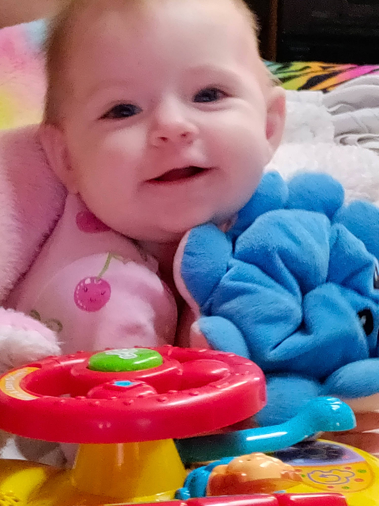 Aria Sky joined the competition — help win amazing prizes! baby, baby_playing_with_toys, baby_products, baby_toddler_clothing, blue, cheek, child, electric_blue, fun, happy, mouth, nose, person, pink, product, sitting, skin, smile, toddler, toy