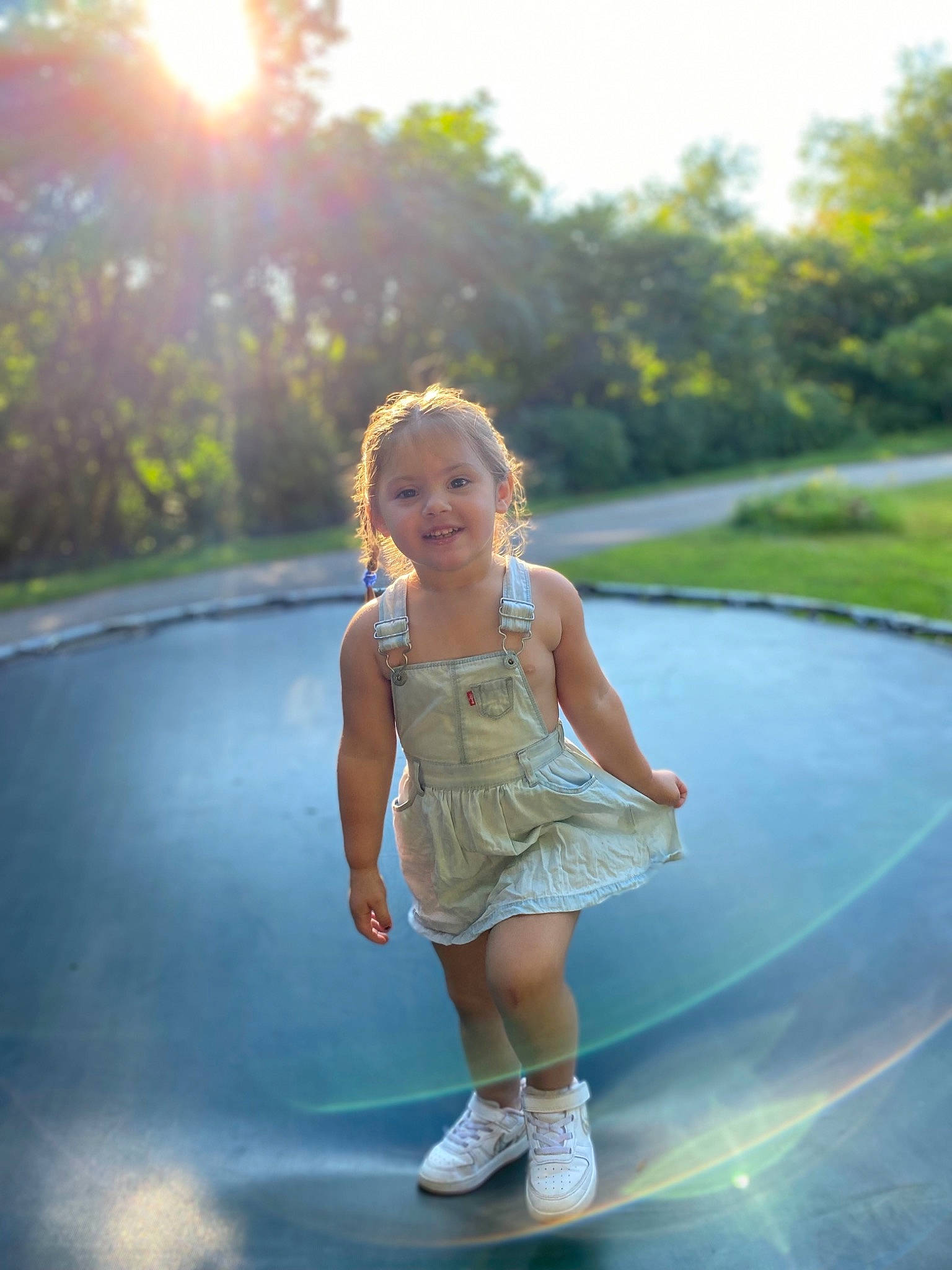 Anneliese Eve is registered to the contest to win money with this photo: asphalt, daytime, dress, facial_expression, flash_photography, footwear, fun, grass, happy, joy, leisure, light, lighting, nature, people_in_nature, person, plant, shoe, shorts, sky