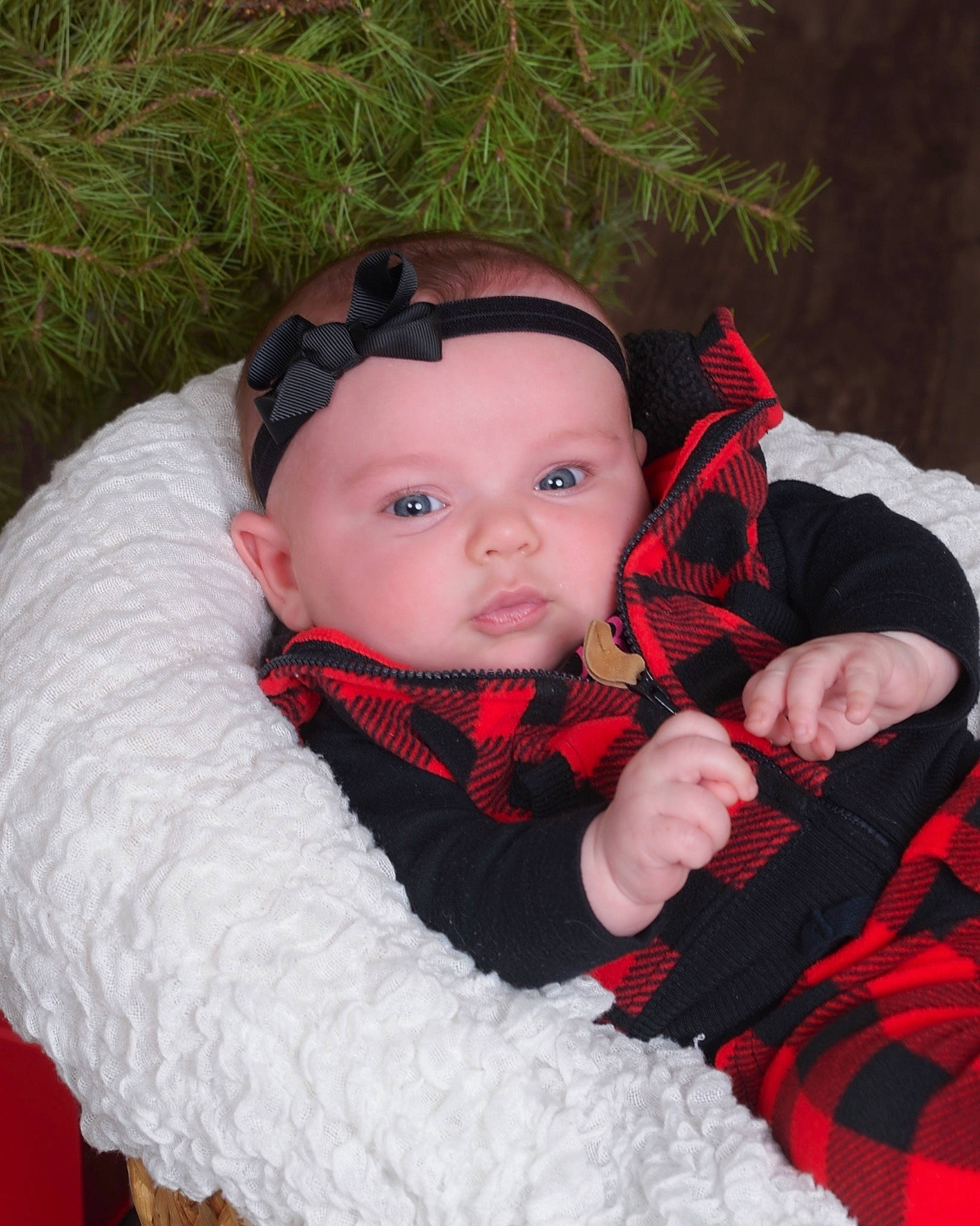 Kinsley is registered to the contest to win money with this photo: baby, baby_products, baby_toddler_clothing, cheek, comfort, costume_accessory, fur, headwear, pattern, person, plaid, tartan, textile, wool, woolen