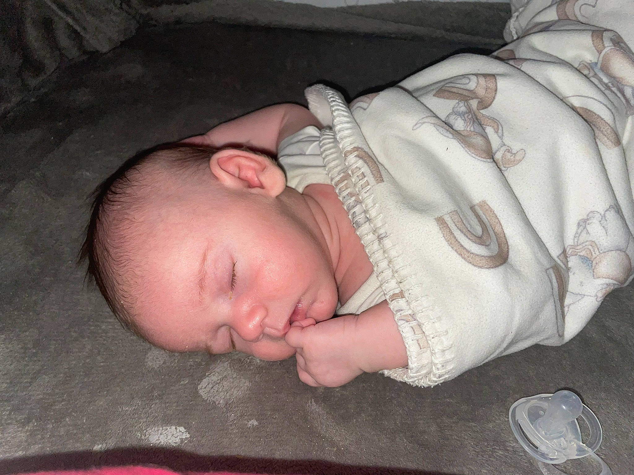 Hunter is registered to the contest to win money with this photo: baby, baby_products, baby_toddler_clothing, bedtime, cheek, child, chin, comfort, eye, flesh, hand, head, linens, mouth, nap, nose, person, room, skin, sleeve