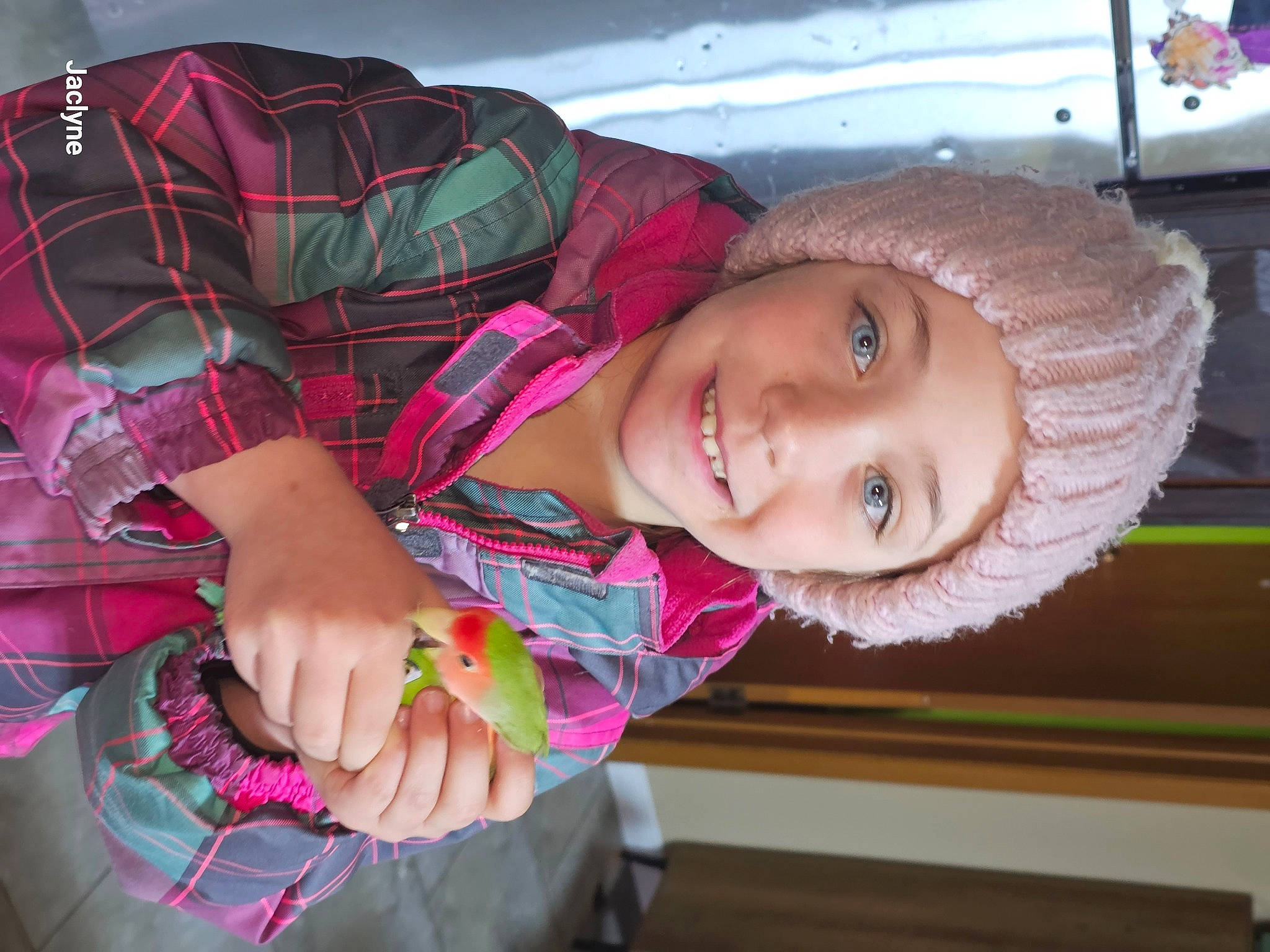 Malika a rejoint le concours — aidez-le/la à gagner de superbes lots ! child, event, fashion_accessory, fun, happy, hat, headwear, joy, laugh, leisure, magenta, pattern, person, pink, plaid, purple, smile, tartan, toddler, travel