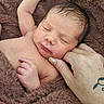 newborn, baby, sleeping, hand, tattoo, blanket, skin, face, fingers, closeup, resting, cozy, infant, soft, comfort, human, portrait, nail_polish, peaceful, warmth