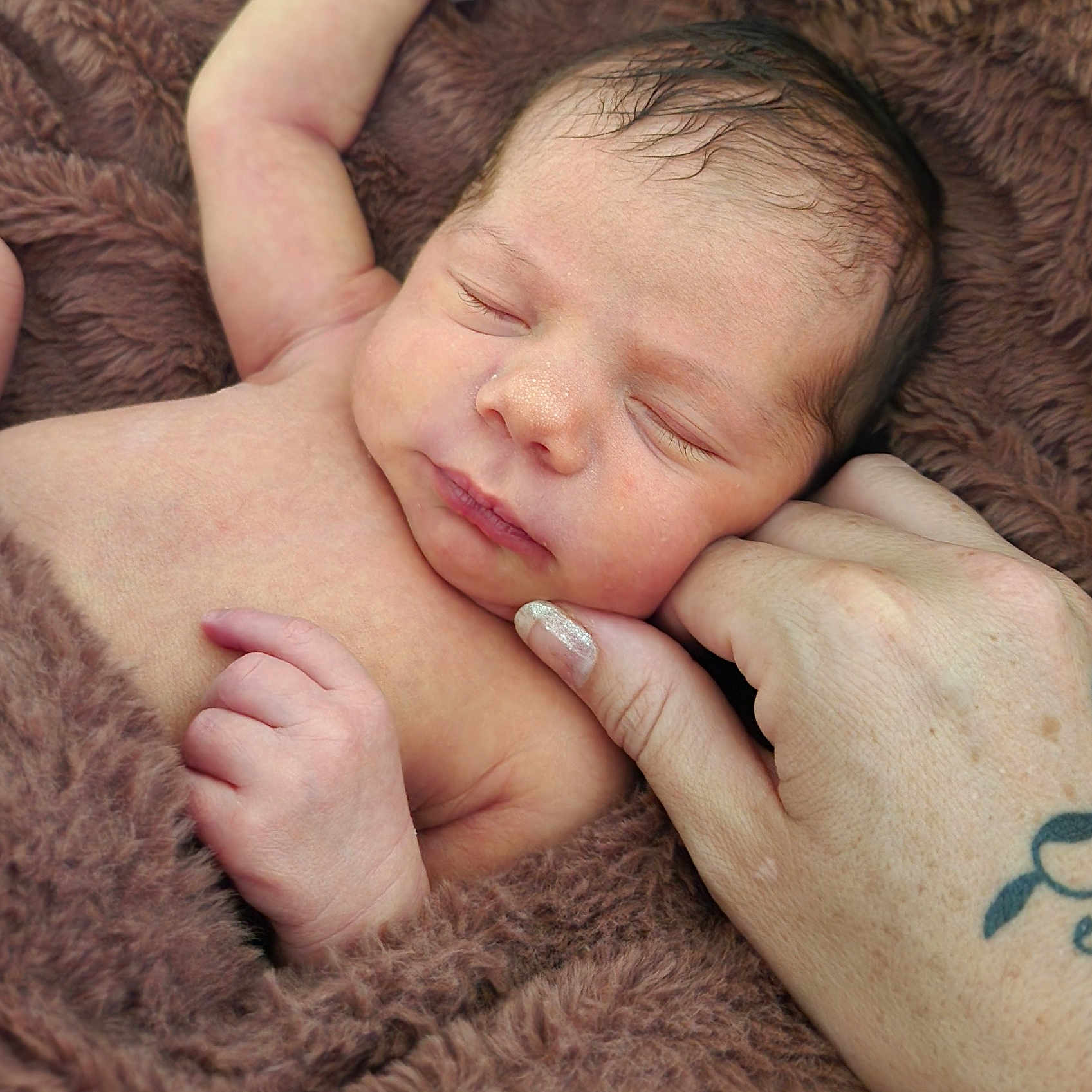 Evelyn is registered to the contest to win money with this photo: newborn, baby, sleeping, hand, tattoo, blanket, skin, face, fingers, closeup, resting, cozy, infant, soft, comfort, human, portrait, nail_polish, peaceful, warmth
