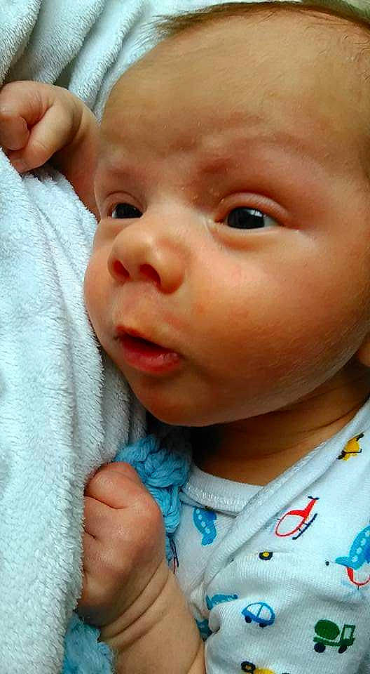 Jaxon Cullen is registered to the contest to win money with this photo: boy, cheek, child, chin, close_up, ear, eye, eyebrow, face, finger, forehead, hand, head, infant, lip, mouth, nose, person, skin, toddler