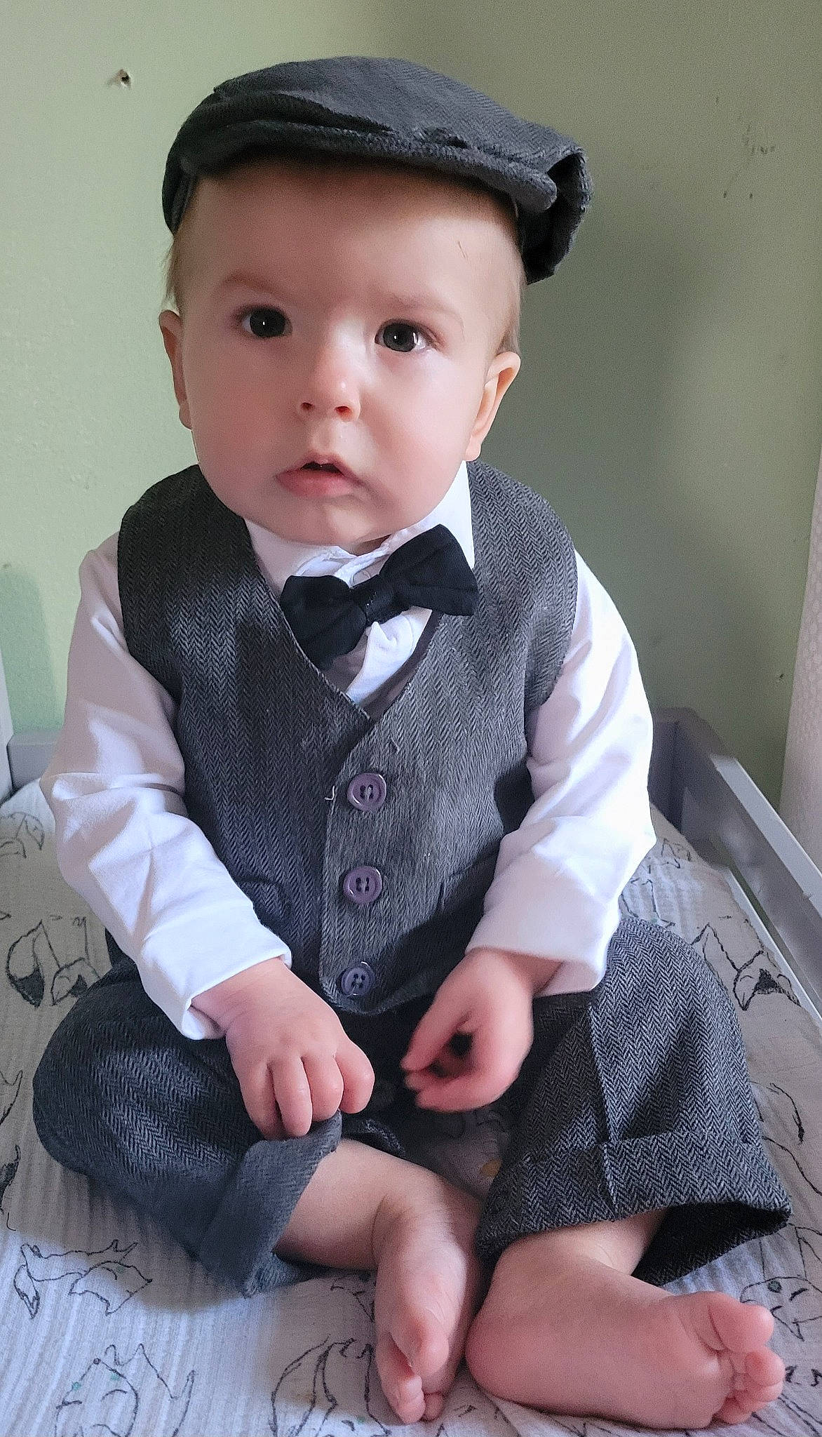Niklaus joined the competition — help win amazing prizes! baby, baby_toddler_clothing, blazer, button, cap, child, chin, collar, dress_shirt, fashion_accessory, formal_wear, hat, pattern, person, sitting, sleeve, sock, sun_hat, tie, toddler