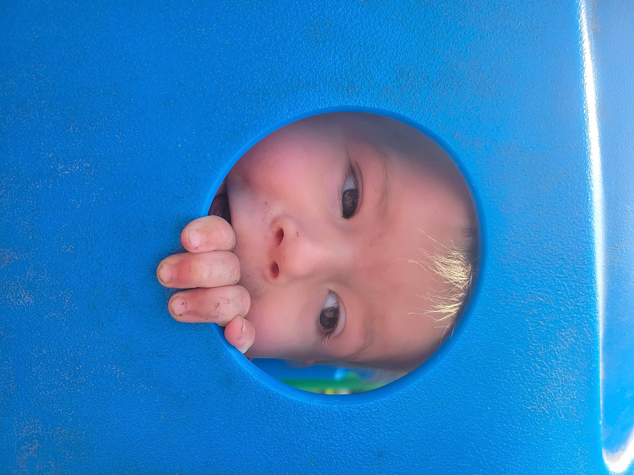 Niklaus is registered to the contest to win money with this photo: baby, baby_toddler_clothing, cheek, child, circle, electric_blue, eyebrow, eyelash, fluid, fun, headwear, iris, nose, person, toddler, water