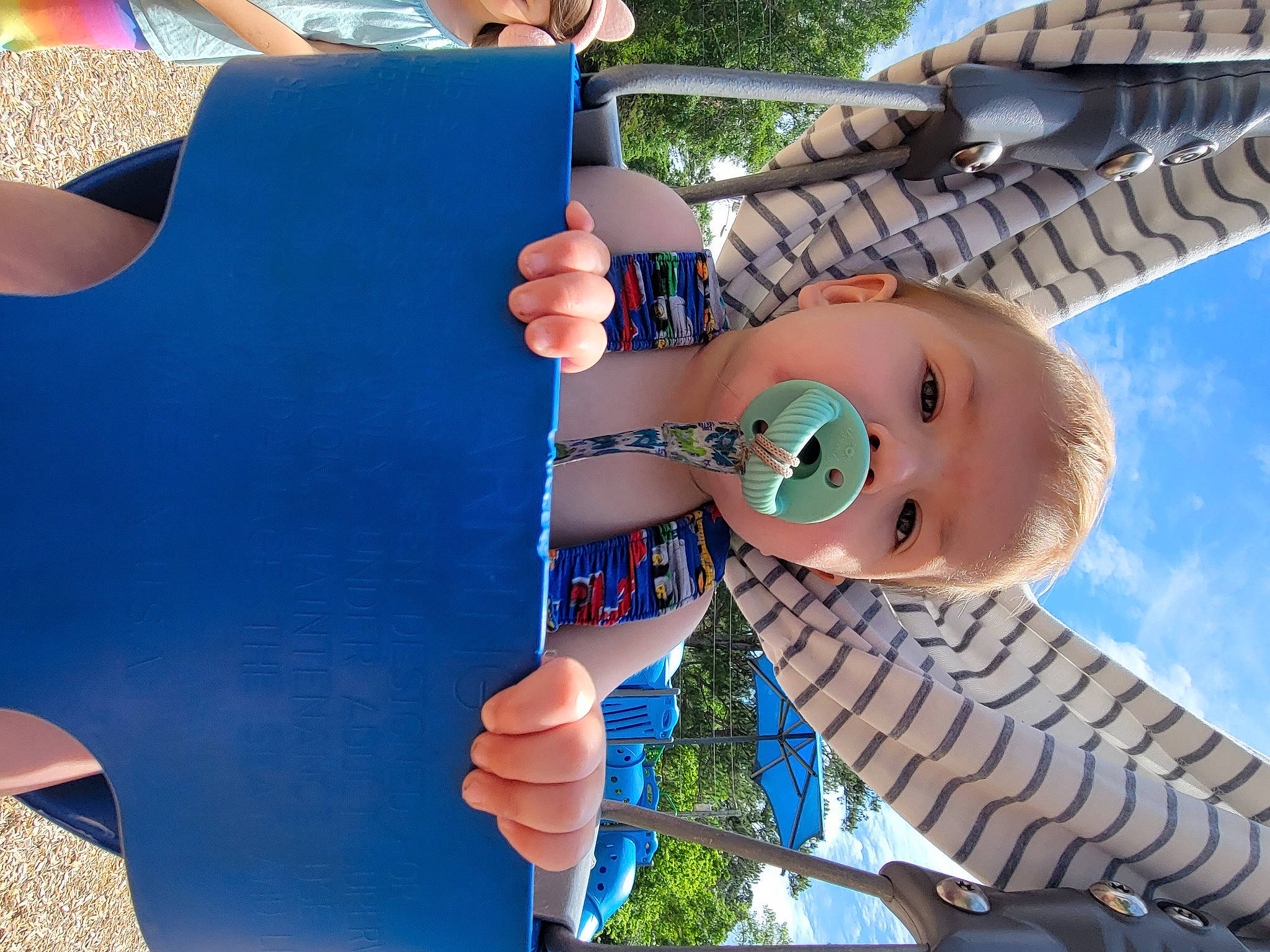 Niklaus joined the competition — help win amazing prizes! azure, blue, child, electric_blue, finger, fun, gesture, hand, happy, human_settlement, leisure, nail, outdoor_play_equipment, person, product, recreation, sky, thumb, toddler, travel