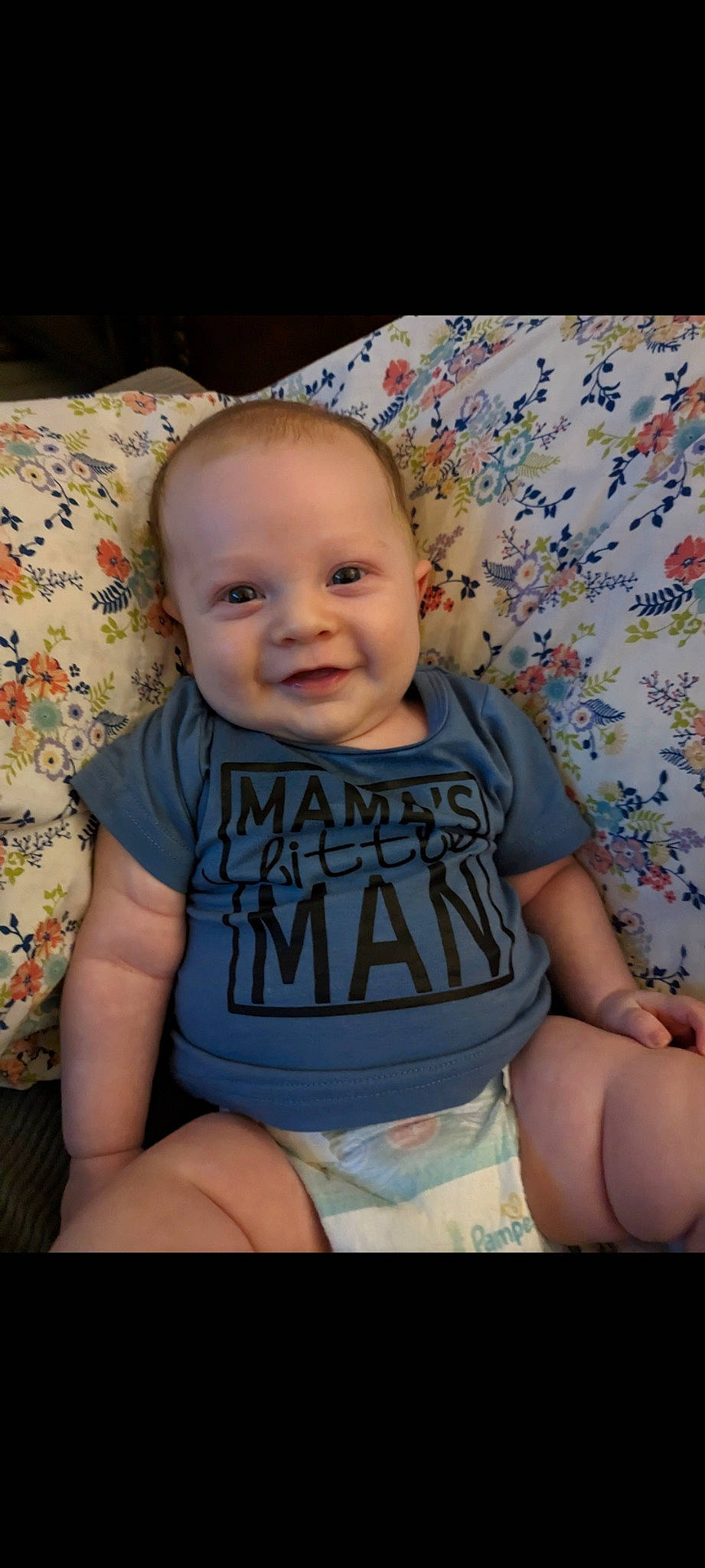 Jasper is registered to the contest to win money with this photo: baby, baby_toddler_clothing, cheek, chin, eye, face, finger, hairstyle, happy, head, iris, joy, leg, mouth, person, pink, product, skin, sleeve, smile