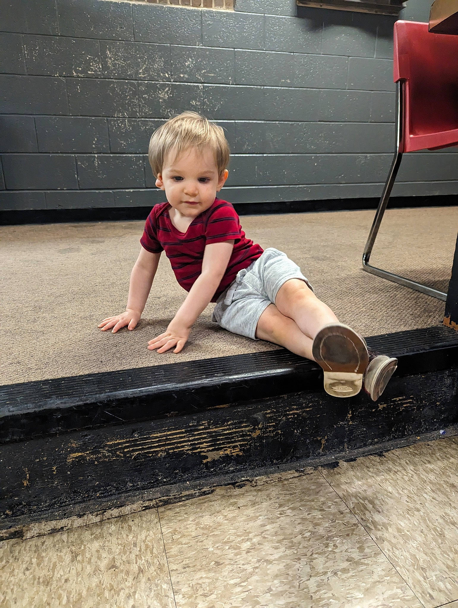 Louie joined the competition — help win amazing prizes! asphalt, baby, baby_toddler_clothing, concrete, floor, flooring, fun, grass, hardwood, human_leg, knee, leisure, person, road_surface, shorts, sidewalk, sitting, t_shirt, tints_and_shades, toddler