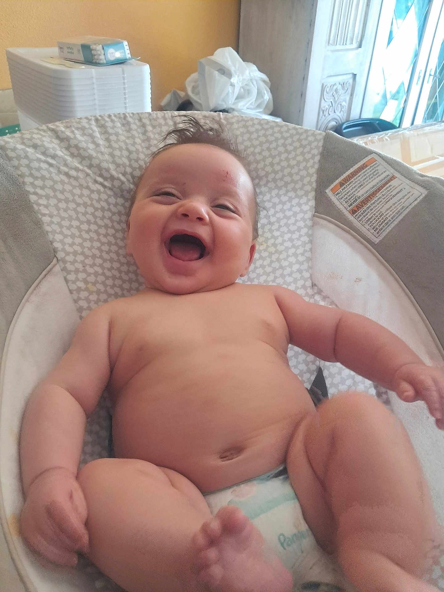 Waylon joined the competition — help win amazing prizes! baby, infant, smiling, laughing, diaper, baby_seat, chubby, cute, happy, skin, hair, indoor, child, person, expression, closeup, relaxed, seat, comfort, funny_face