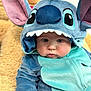 Emanuel is registered to the contest to win money with this photo: baby, blanket, blue, cheeks, child, closeup, costume, cozy, cute, ears, eyes, face, hood, indoor, plush_toy, portrait, sleepwear, soft_texture, toddler, turquoise