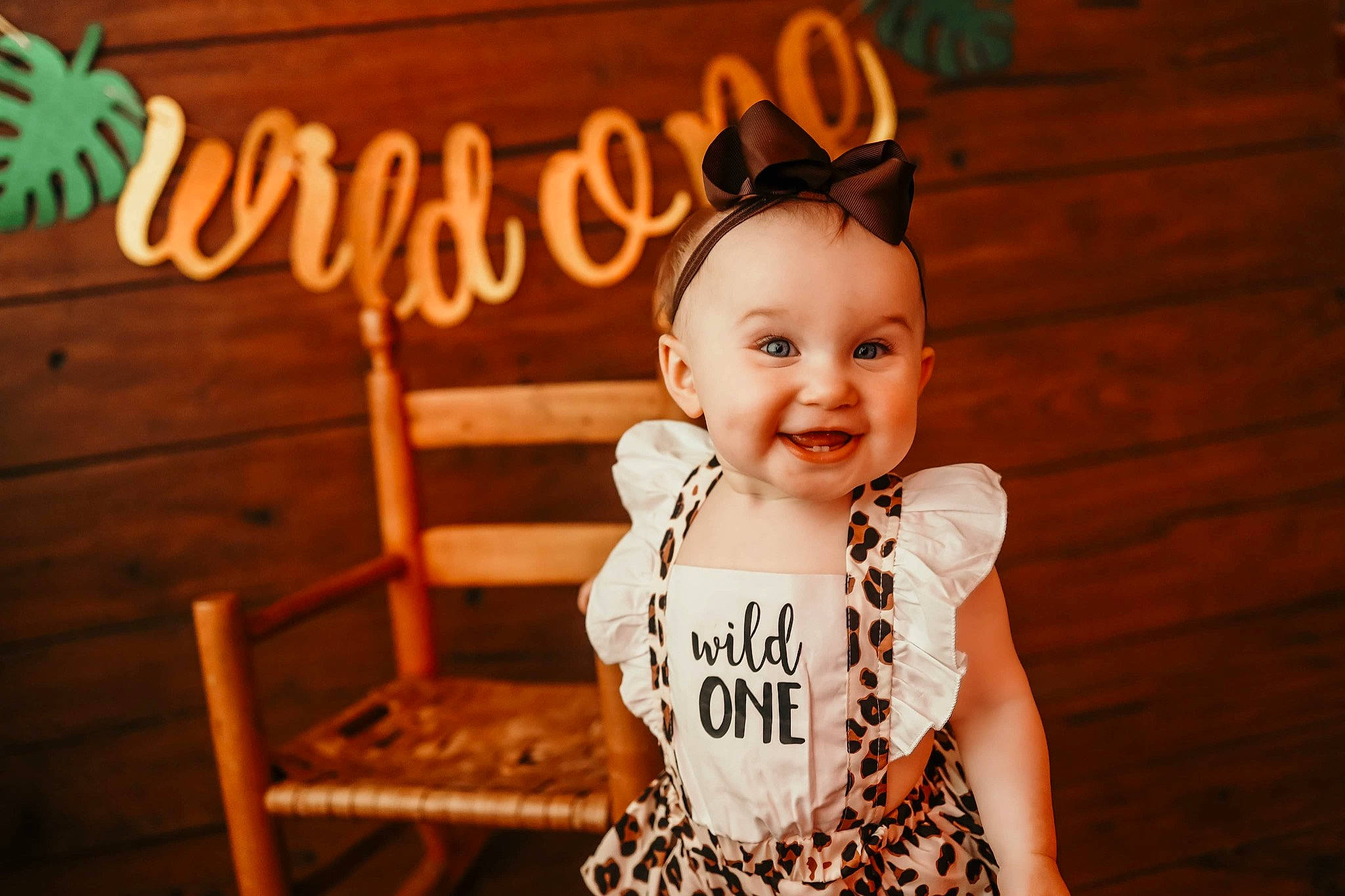 Harper joined the competition — help win amazing prizes! baby, baby_toddler_clothing, chair, child, event, fashion_accessory, flash_photography, font, fun, happy, hardwood, headband, joy, laugh, party, person, sitting, sleeve, smile, t_shirt