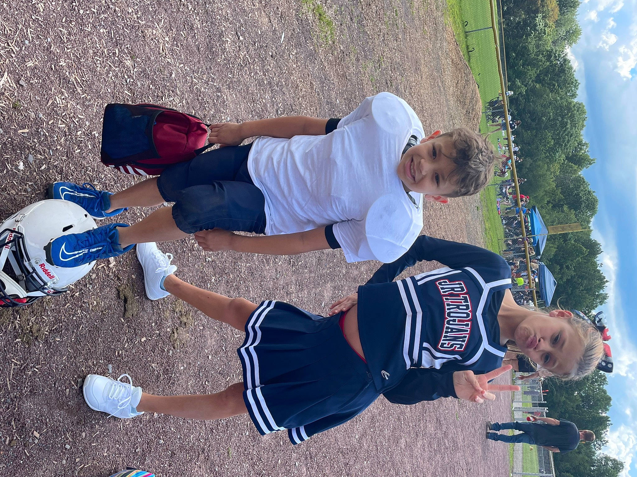 Arianna Deleon is registered to the contest to win money with this photo: blue, fun, hat, human_leg, joy, knee, leg, leisure, person, player, recreation, shoe, shorts, sky, sneakers, sports, sports_uniform, t_shirt, thigh, tree