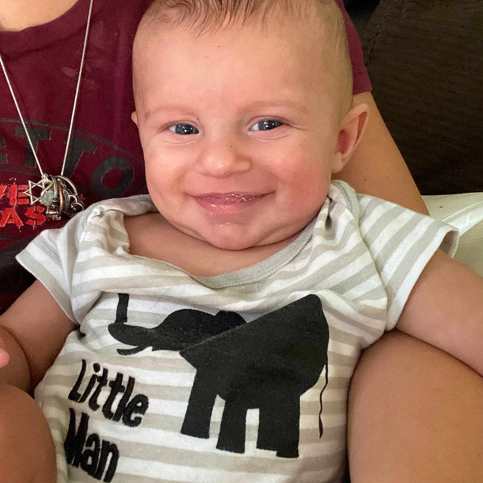 Gaige joined the competition — help win amazing prizes! accessories, baby, clothing, couch, face, furniture, happy, head, homedecor, jewelry, laughing, necklace, newborn, person, photography, portrait, selfie, shirt, smile, t_shirt