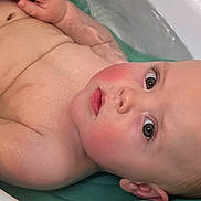 Jaxson joined the competition — help win amazing prizes! baby, bathtub, water, skin, child, infant, face, head, relaxing, bath, rosy_cheeks, eyes, arms, torso, human, young, bathroom, support, curious, indoors