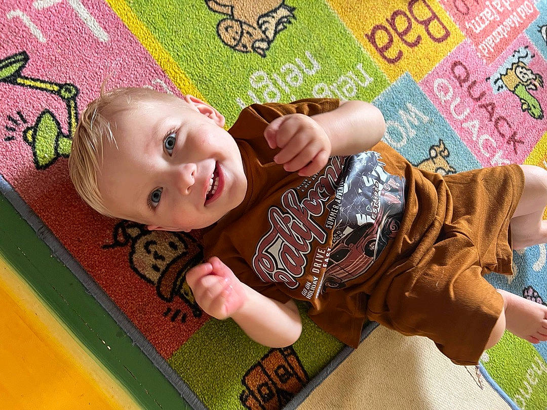 Tylin joined the competition — help win amazing prizes! baby, baby_products, baby_toddler_clothing, cheek, child, flooring, fun, grass, happy, leisure, magenta, organ, pattern, person, pink, play, room, skin, smile, toddler