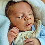 Djamaïly participe au concours pour gagner de l'argent avec cette photo : baby, newborn, sleeping, blanket, infant, closeup, cute, peaceful, soft, hand, face, clothing, portrait, wrapped, cozy, skin, indoors, rest, warm, child