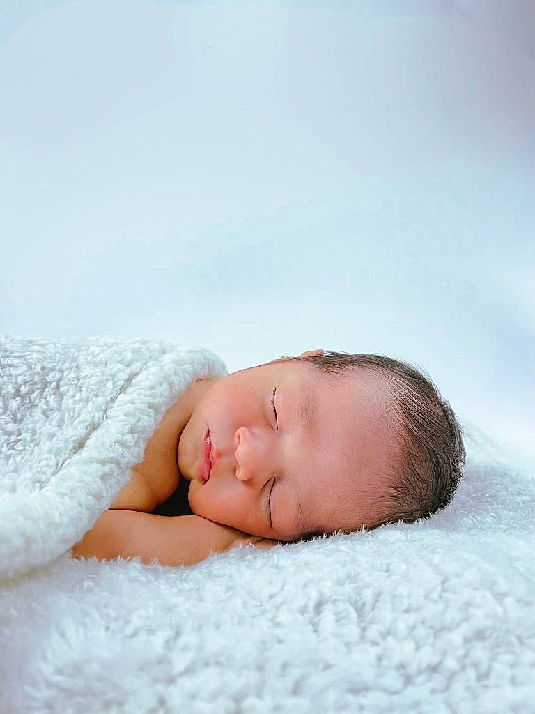 Benjamin is registered to the contest to win money with this photo: baby, baby_sleeping, baby_toddler_clothing, bedding, bedtime, cheek, child, comfort, eyelash, face, fashion_accessory, flash_photography, fur, linens, lip, nap, neck, person, skin, sleeve