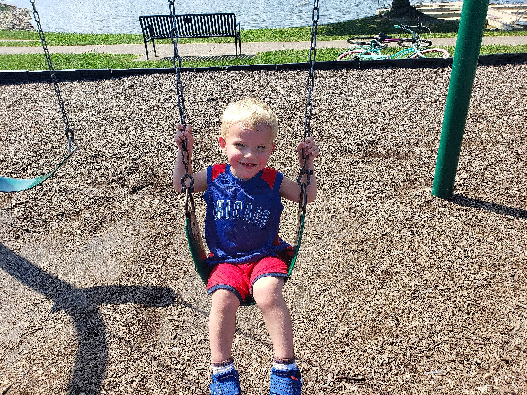 James joined the competition — help win amazing prizes! baby, child, city, electric_blue, fun, grass, happy, joy, leisure, outdoor_play_equipment, people_in_nature, person, play, playground, public_space, recreation, sky, smile, soil, swing