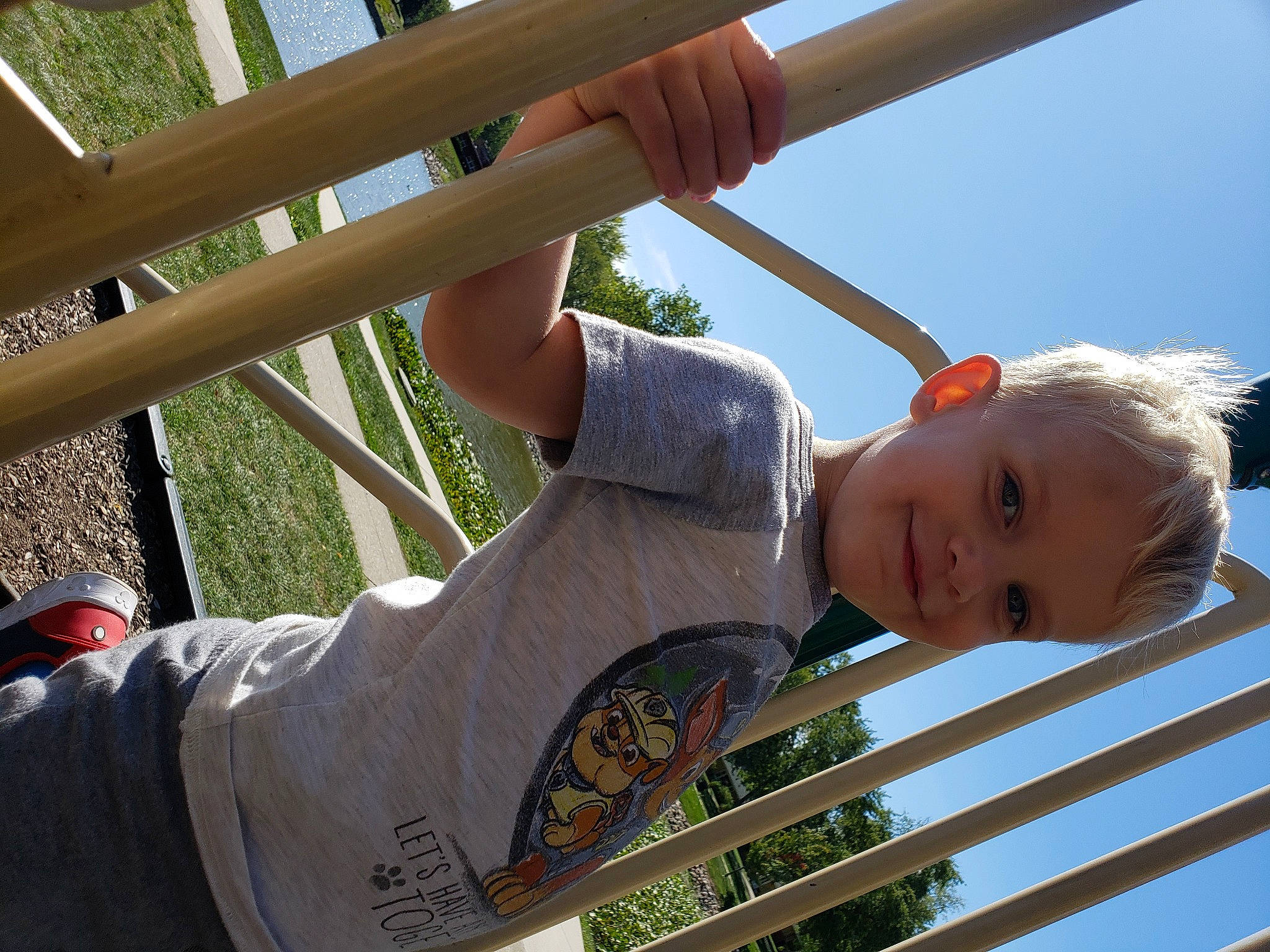 James joined the competition — help win amazing prizes! baby, baby_toddler_clothing, elbow, finger, fun, grass, happy, joy, leisure, line, organ, outdoor_play_equipment, person, playground, recreation, shade, sky, snapshot, swing, toddler