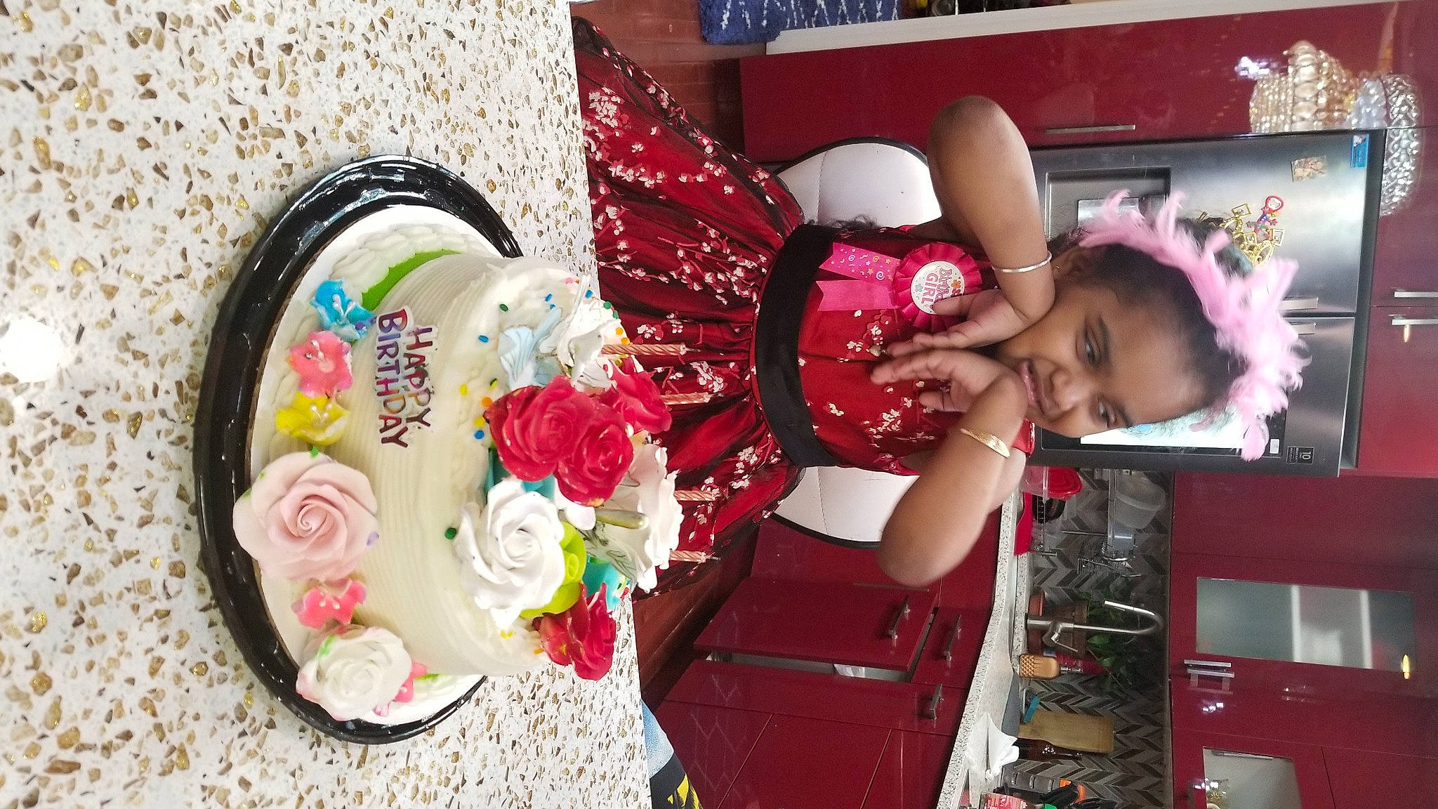 Kendra is registered to the contest to win money with this photo: bouquet, child, circle, cut_flowers, event, fashion_accessory, fashion_design, floral_design, flower, flower_arranging, happy, magenta, person, petal, pink, plant, room, rose, textile, toy