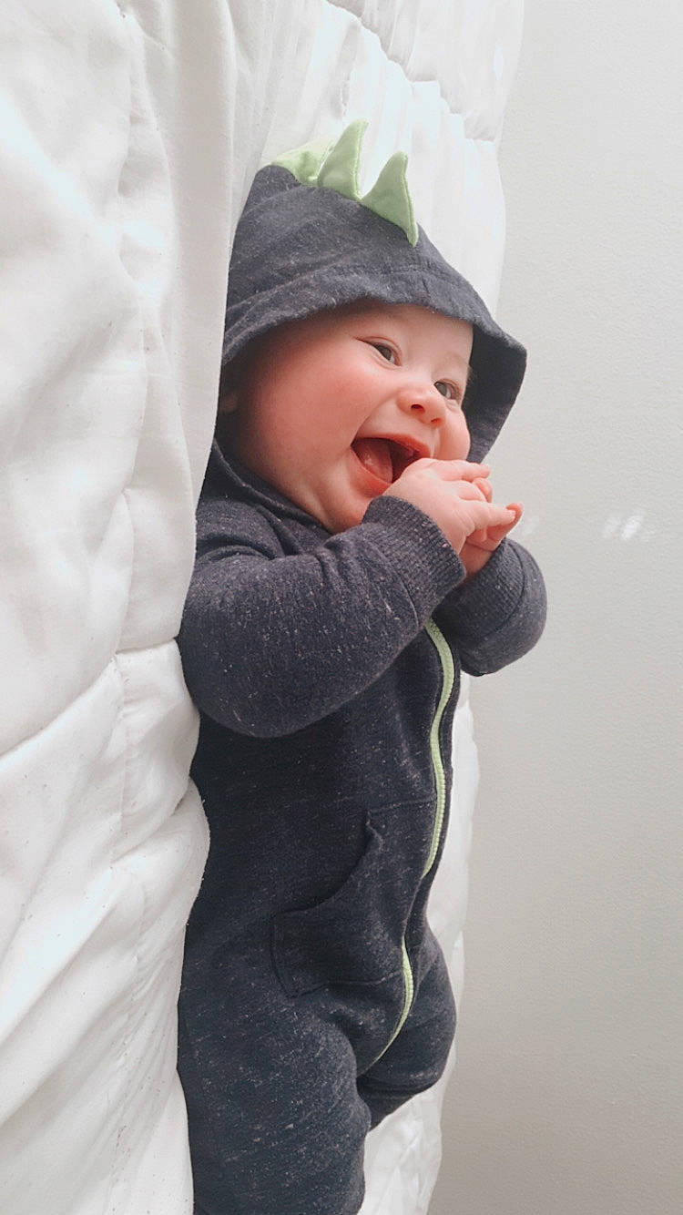 Julius is registered to the contest to win money with this photo: baby, child, headwear, nose, outerwear, person, toddler