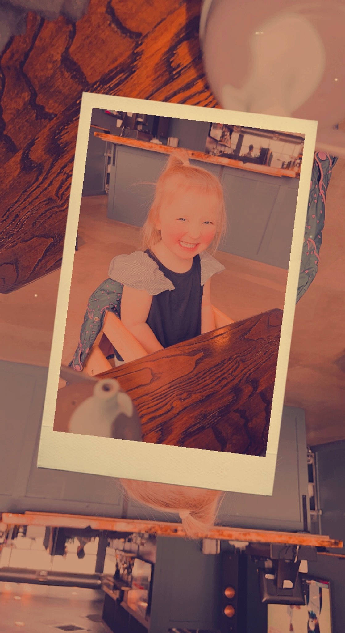 Paisley is registered to the contest to win money with this photo: advertising, art, baby, brown, easel, font, graphic_design, graphics, illustration, joy, orange, paper_product, person, photographic_paper, poster, rectangle, room, smile, space, toddler