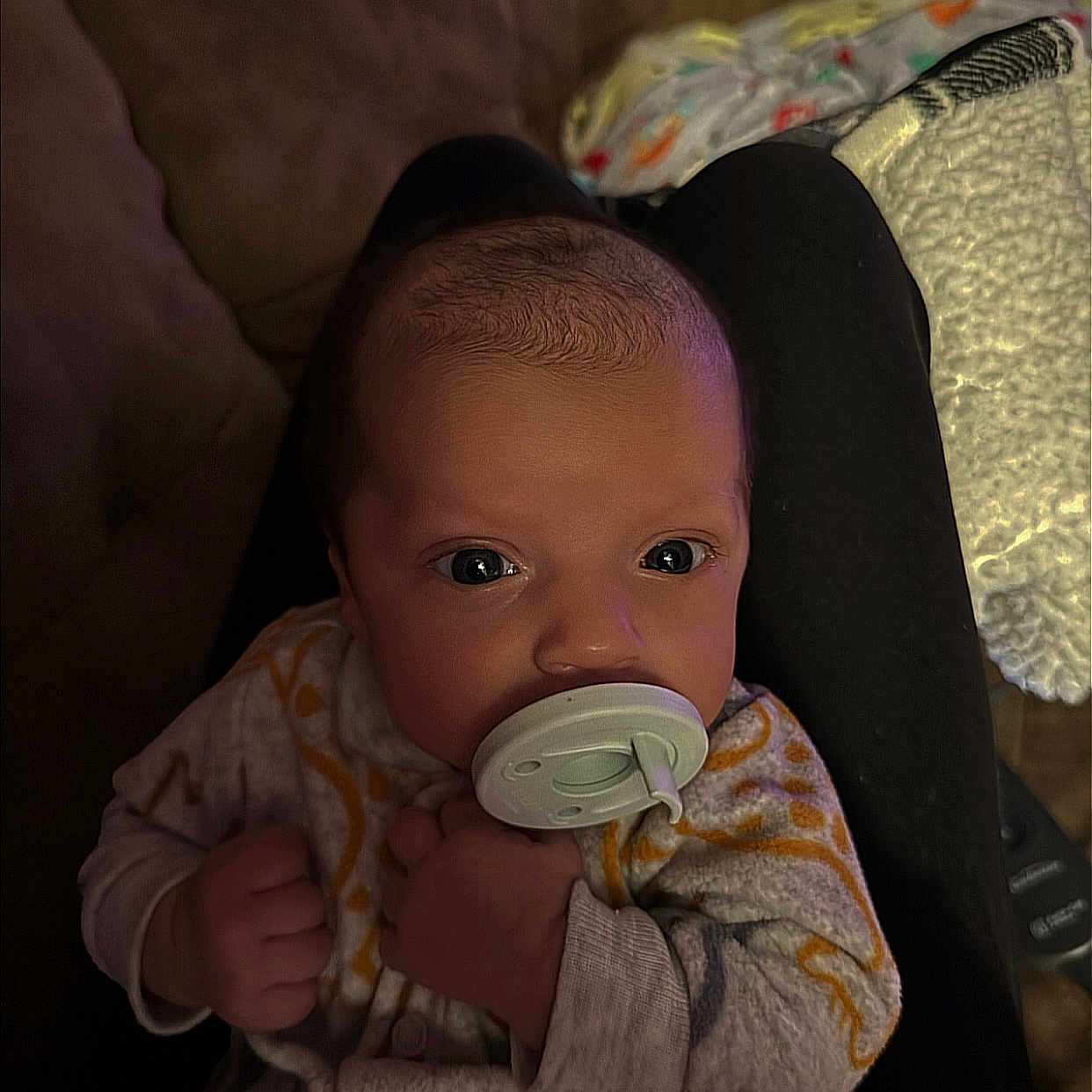 Bellamy is registered to the contest to win money with this photo: baby, bodypart, bonnet, clothing, couch, cushion, face, finger, furniture, hand, hat, head, homedecor, knitwear, newborn, person, photography, portrait, sitting, sweater