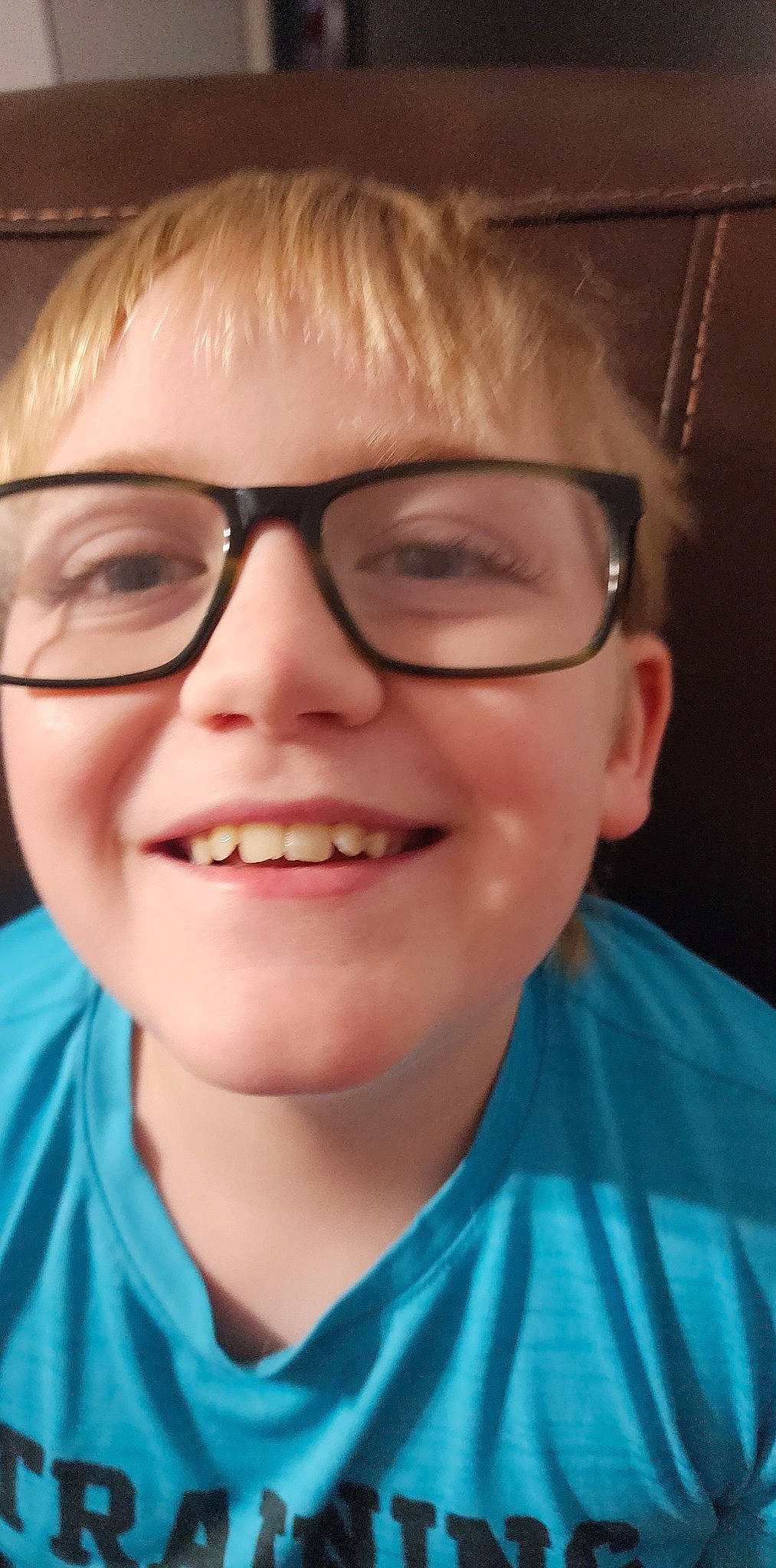 Clinton is registered to the contest to win money with this photo: cheek, cool, eye, eye_glass_accessory, eyebrow, eyewear, forehead, fun, glasses, happy, iris, jaw, joy, lip, mouth, nose, person, skin, sleeve, smile