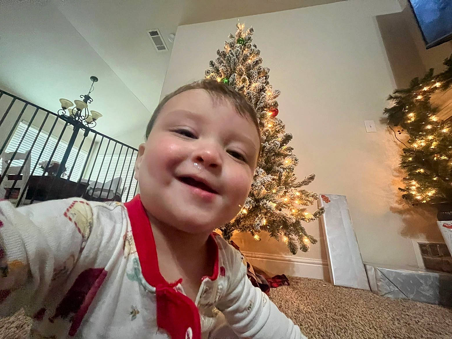 Fernando joined the competition — help win amazing prizes! christmas, christmas_decoration, christmas_eve, christmas_lights, christmas_ornament, christmas_tree, conifer, event, fun, happy, headwear, holiday, holiday_ornament, joy, ornament, person, plant, sleeve, smile, toddler
