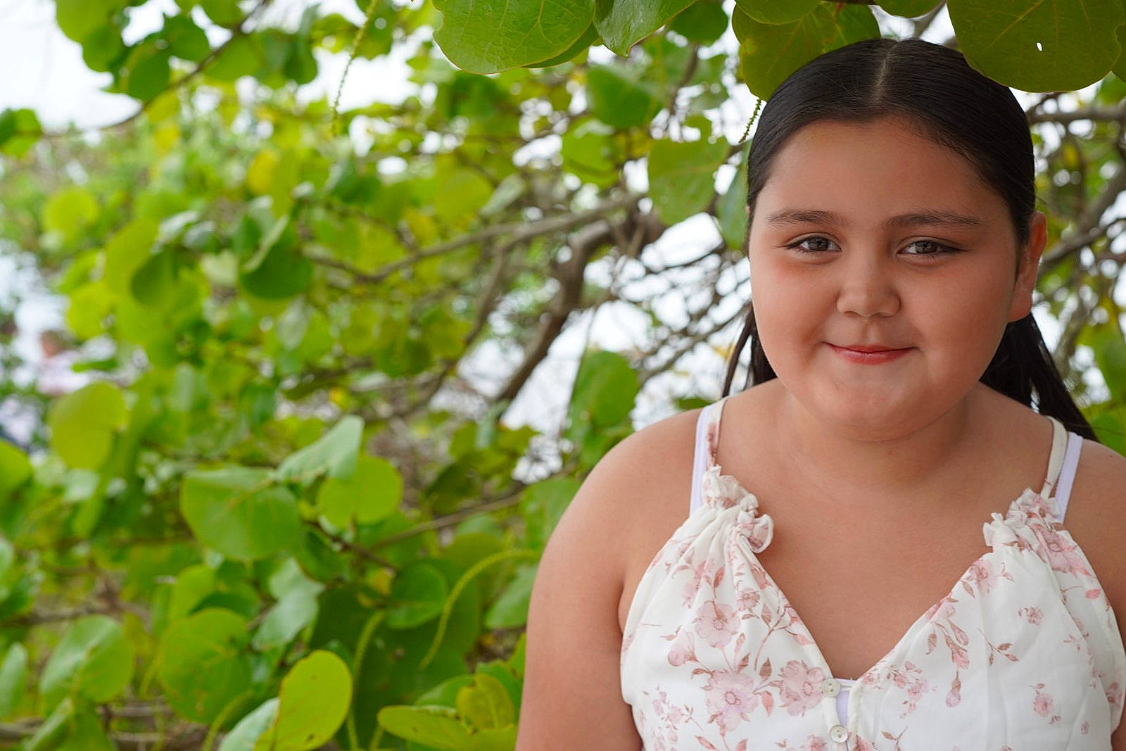 Faith is registered to the contest to win money with this photo: branch, child, event, eye, eyewear, fashion_accessory, flowering_plant, fruit, grass, hair_accessory, happy, headpiece, jewellery, joy, leisure, necklace, people_in_nature, person, plant, portrait_photography