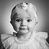 Wintyr Freya is registered to the contest to win money with this photo: baby, child, portrait, black_and_white, headband, bow, dress, tulle, cute, smile, face, eyes, infant, fashion, studio, adorable, young, person, closeup, cute_outfit