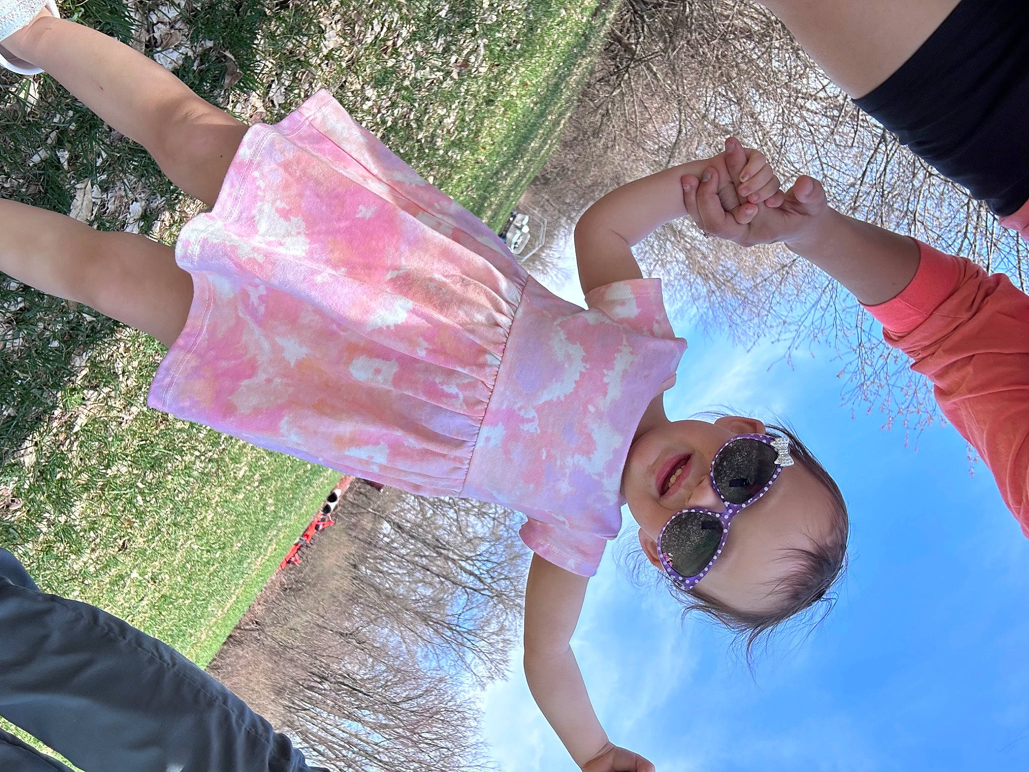 Emileigh is registered to the contest to win money with this photo: child, event, eyewear, fun, gesture, goggles, grass, happy, human_leg, leisure, magenta, people_in_nature, person, photography, pink, play, sunglasses, thigh, tree, vacation