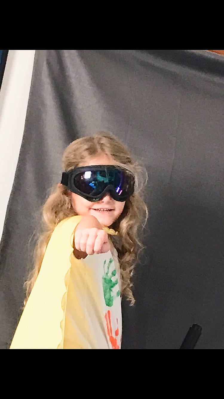 Alice is registered to the contest to win money with this photo: blond, child, electric_blue, event, eyewear, fashion_accessory, fashion_design, flash_photography, fun, gesture, goggles, happy, joy, long_hair, person, personal_protective_equipment, recreation, sleeve, smile, sunglasses