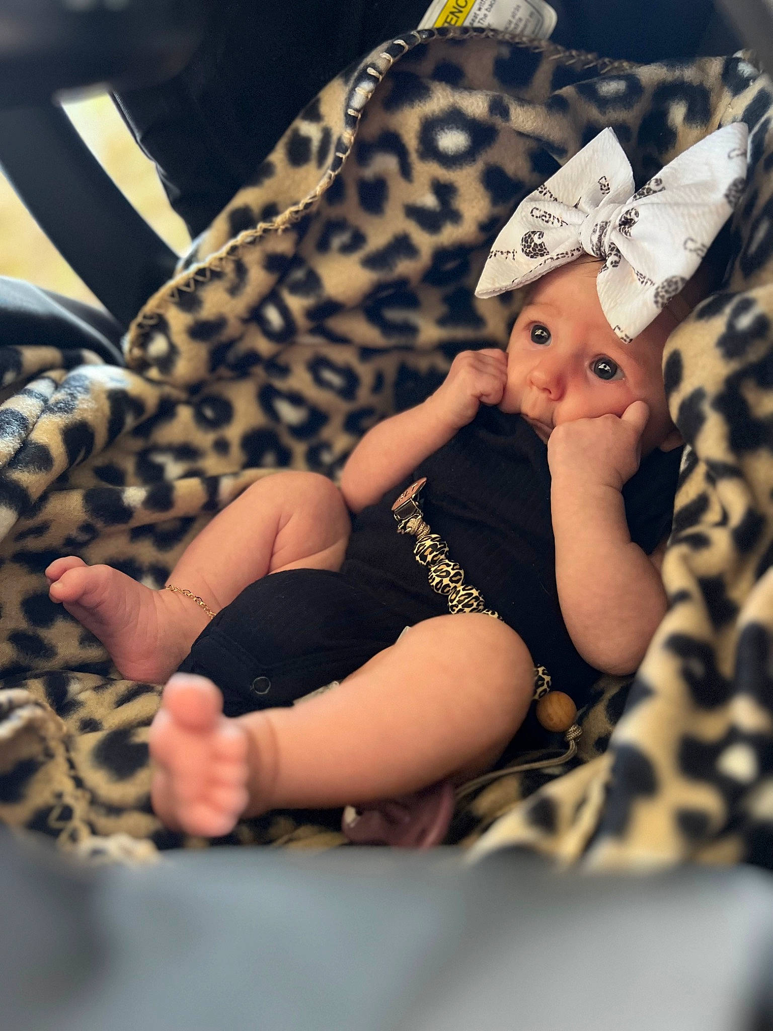 Aspen joined the competition — help win amazing prizes! baby, baby_toddler_clothing, cap, child, comfort, fashion_accessory, fashion_design, happy, hat, headband, headwear, human_leg, jewellery, knee, leg, nail, pattern, person, sitting, sleeve