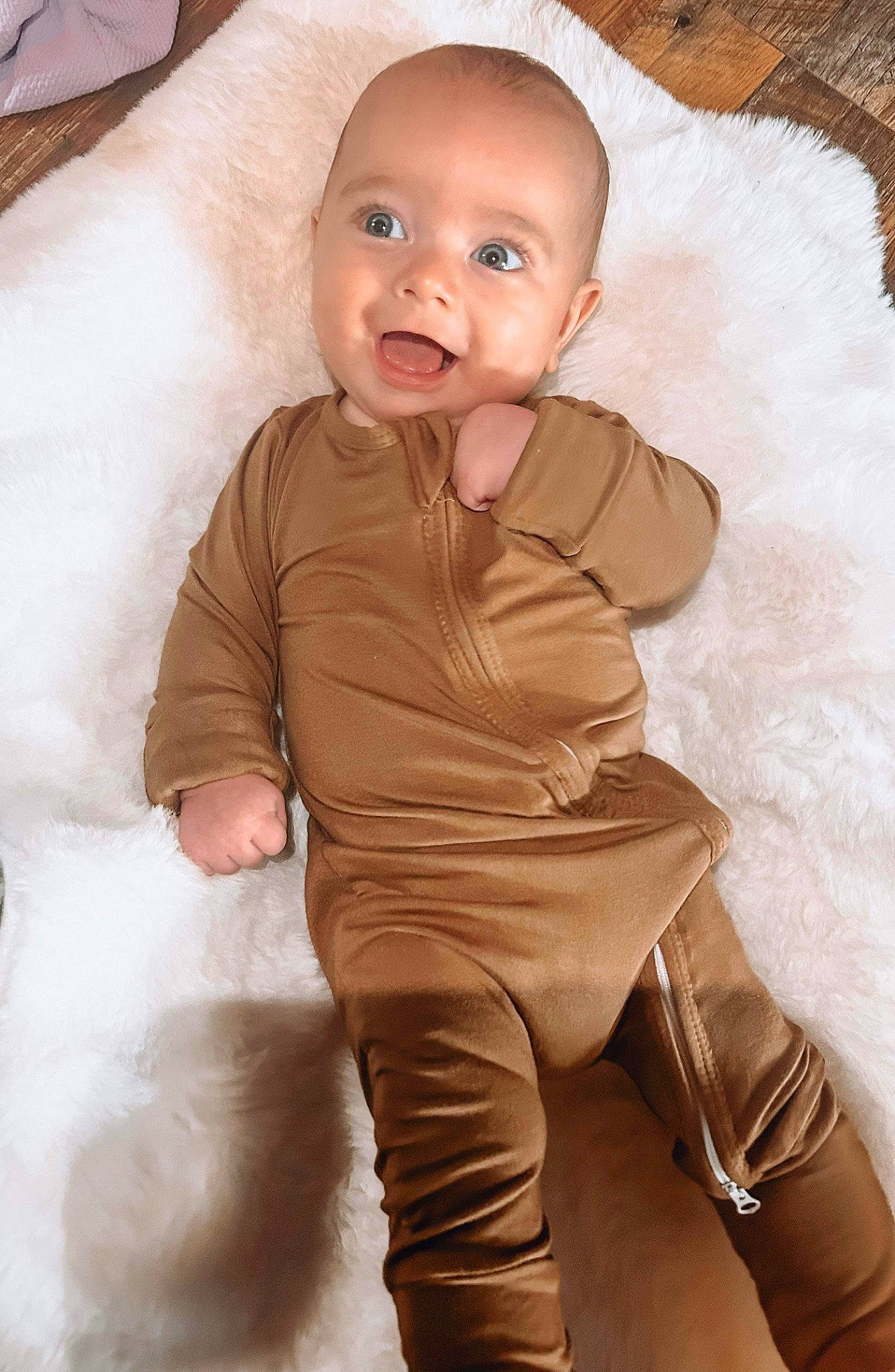 Sammy is registered to the contest to win money with this photo: baby, baby_toddler_clothing, cheek, child, comfort, eye, flash_photography, flooring, happy, head, human_body, human_leg, linens, person, skin, sleeve, smile, t_shirt, textile, toddler