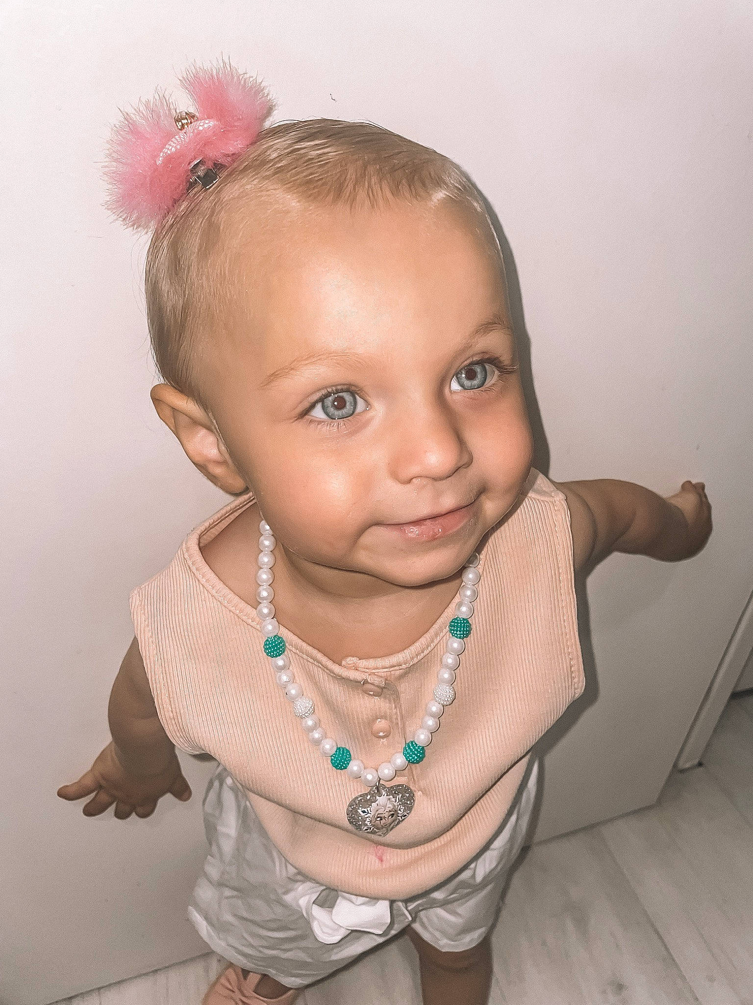 Kassy participe au concours pour gagner de l'argent avec cette photo : baby, baby_toddler_clothing, cheek, child, ear, eye, eyebrow, eyelash, flash_photography, gesture, happy, head, human_body, iris, jewellery, joy, lip, nose, person, pink