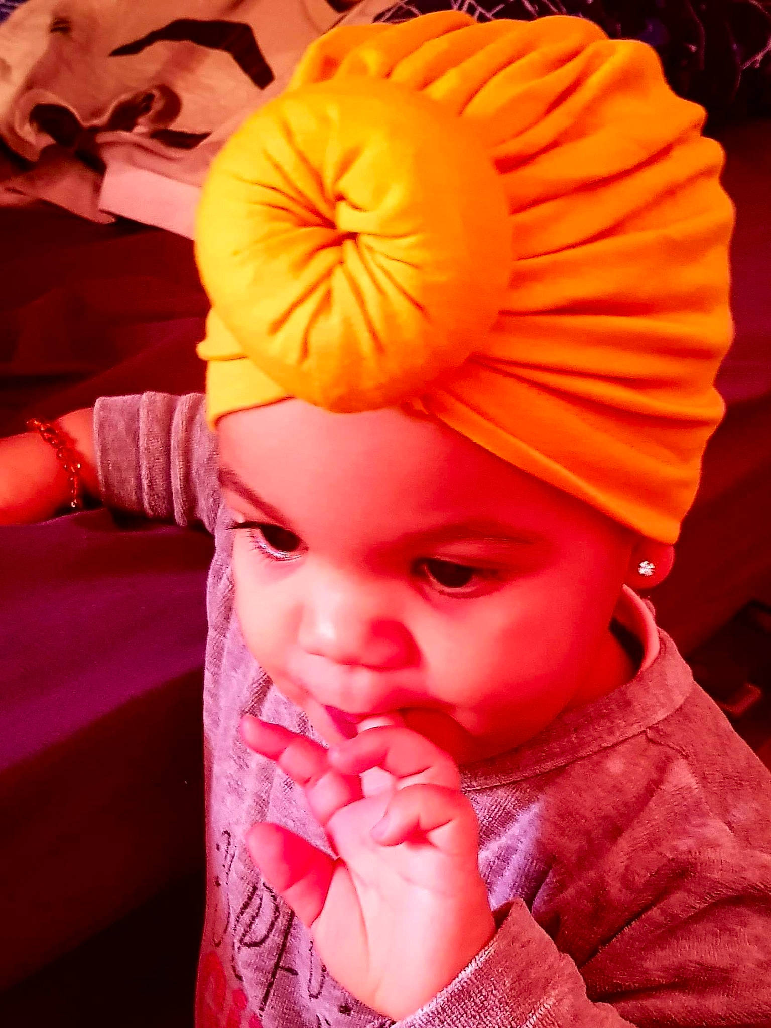 Sianna participe au concours pour gagner de l'argent avec cette photo : baby, beanie, bonnet, cap, cheek, child, clothing, headgear, headwear, knit_cap, peach, person, toddler, wool