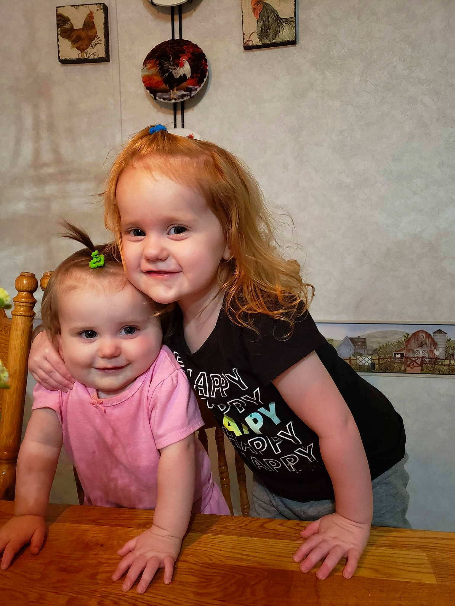 Ember joined the competition — help win amazing prizes! baby_toddler_clothing, chair, cheek, child, floor, flooring, fun, hairstyle, happy, hardwood, iris, joy, person, picture_frame, skin, smile, standing, t_shirt, table, tableware