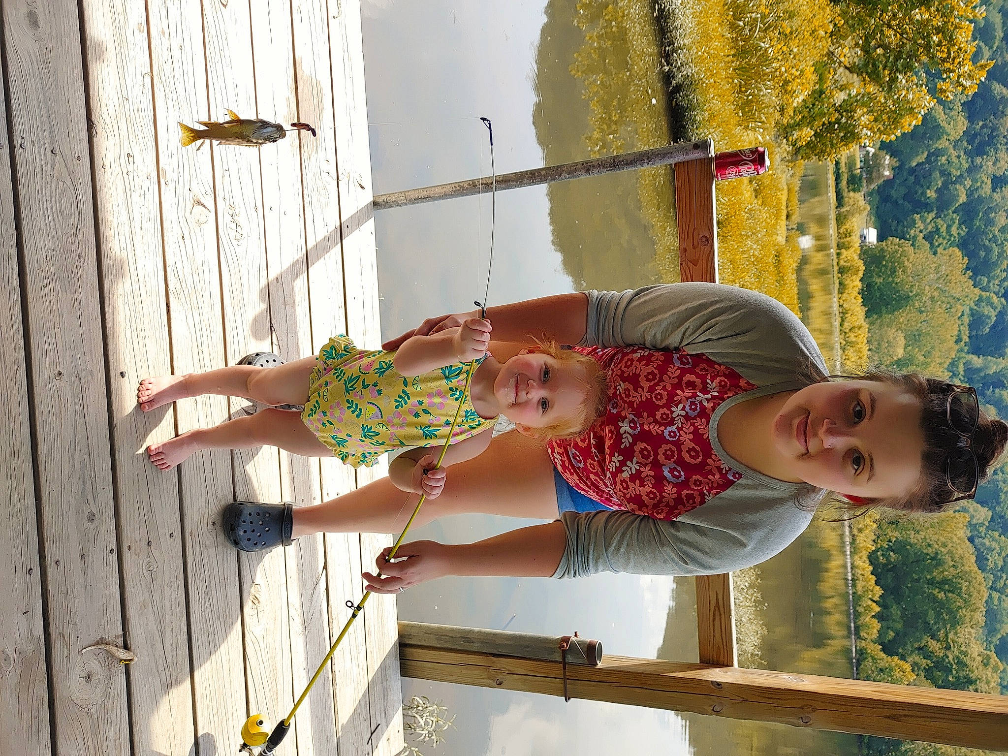 Skylin is registered to the contest to win money with this photo: child, foot, fun, grass, happy, human_leg, joy, leisure, light, pattern, people_in_nature, person, plant, sky, smile, thigh, toddler, tree, waist, water