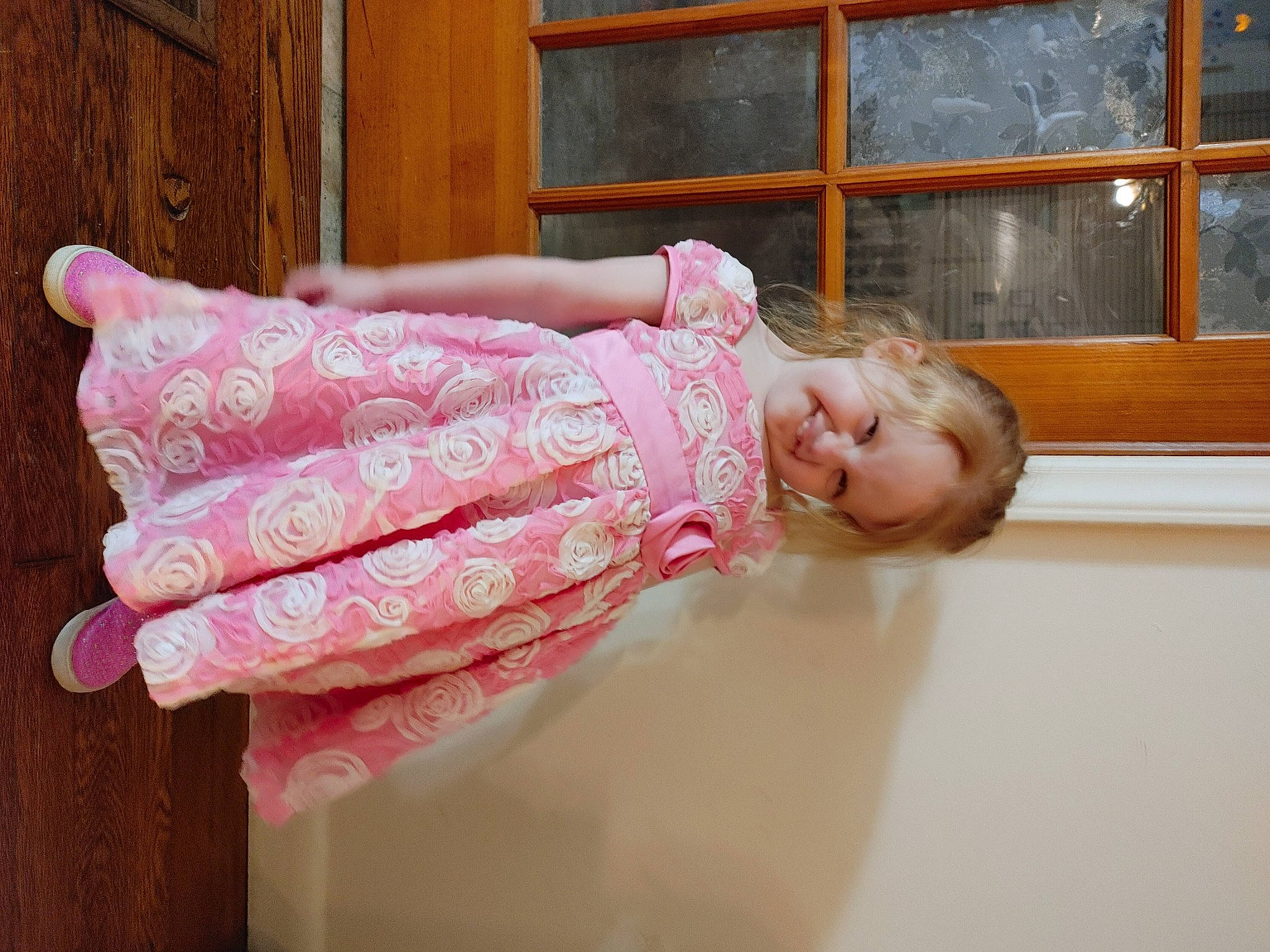 Skylin is registered to the contest to win money with this photo: baby, baby_laughing, baby_toddler_clothing, child, door, embellishment, fun, happy, hardwood, joy, leisure, magenta, pattern, peach, person, pink, room, sleeve, smile, toddler