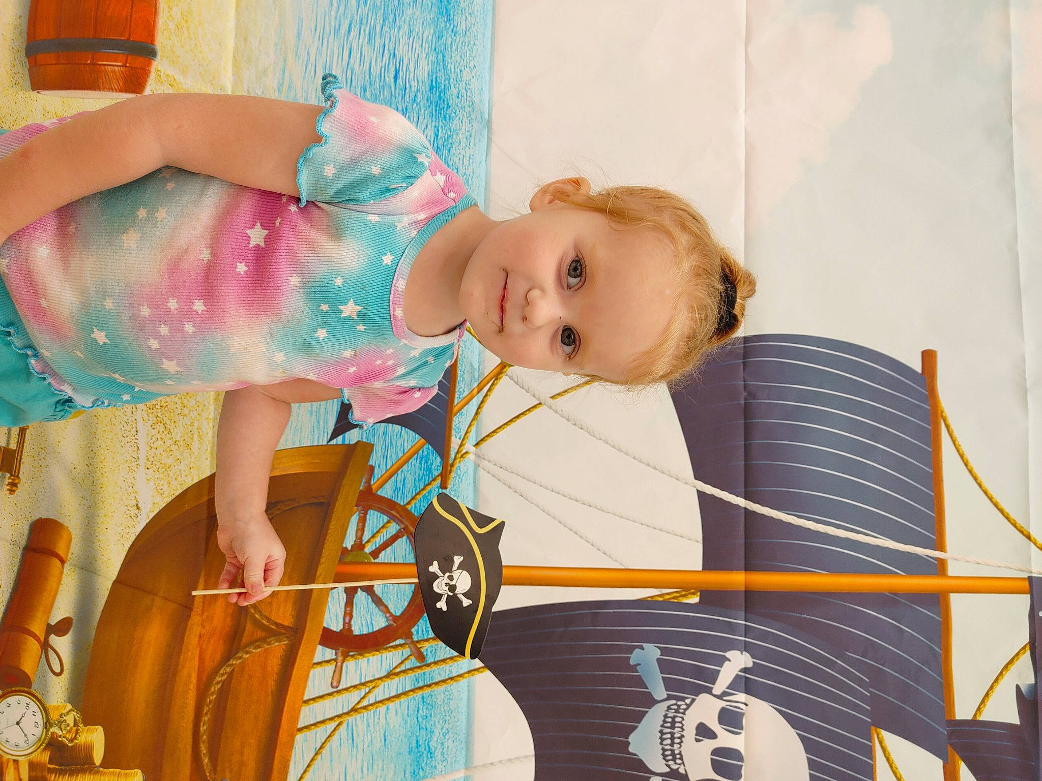 Skylin is registered to the contest to win money with this photo: art, baby, baby_products, baby_toddler_clothing, child, dress, eye, facial_expression, fun, hairstyle, happy, leisure, pattern, person, product, room, sitting, smile, standing, textile