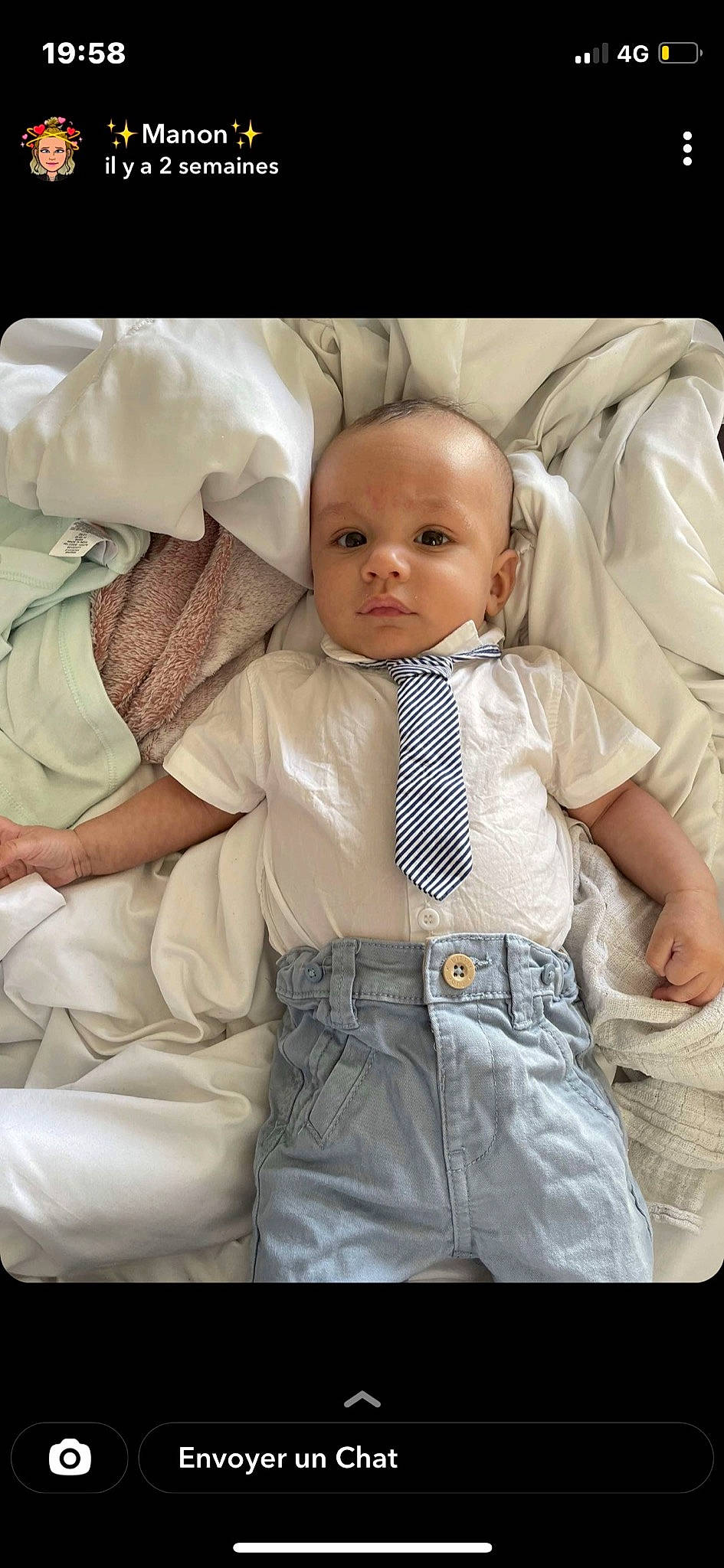 Amaël participe au concours pour gagner de l'argent avec cette photo : baby, baby_toddler_clothing, blond, cheek, child, collar, comfort, eye, flash_photography, gesture, happy, linens, outerwear, person, product, sitting, skin, sleeve, textile, tie